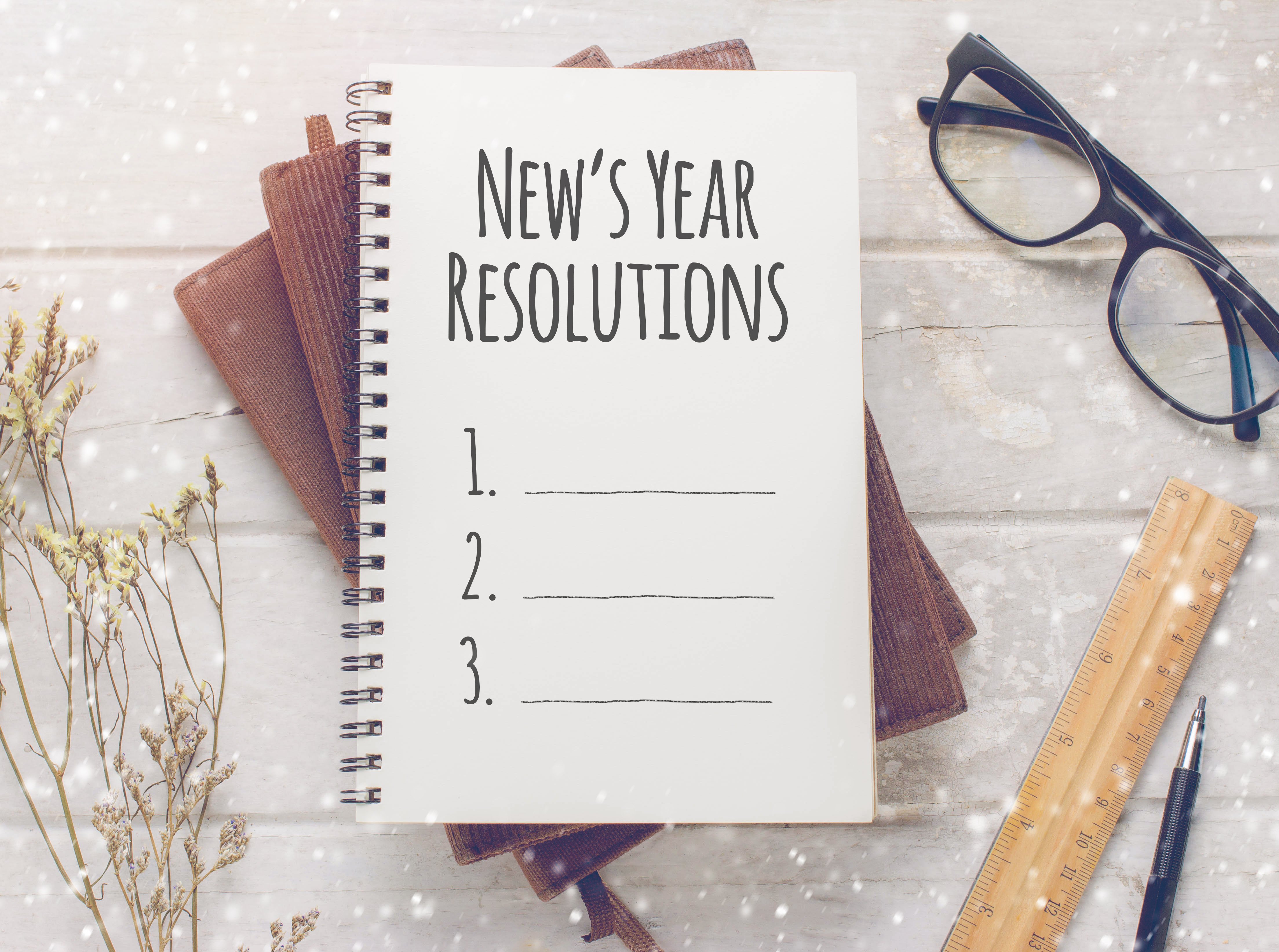 Diary On Text with New Year's Resolutions on