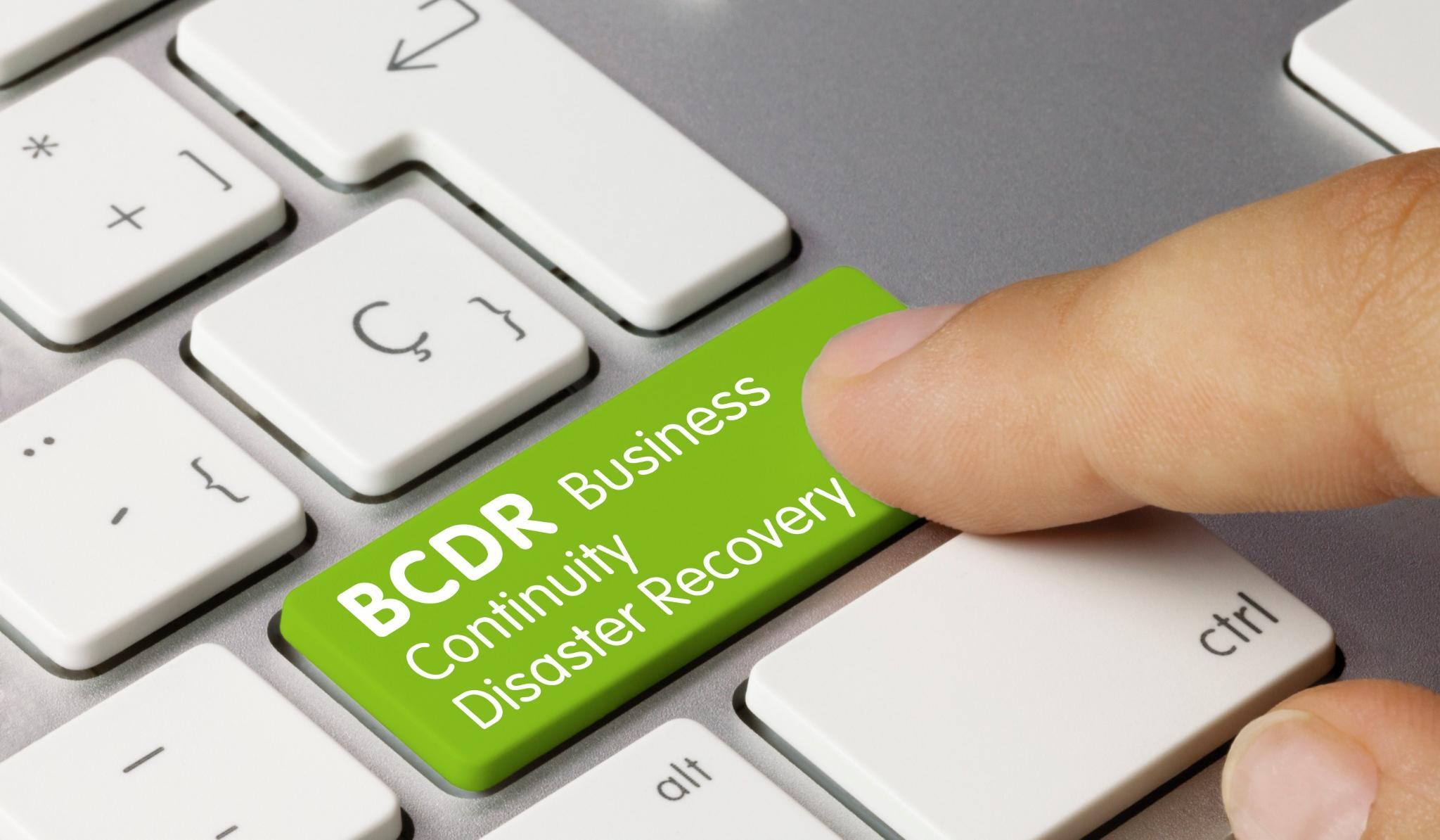 Button on a laptop keyboard that reads BCDR