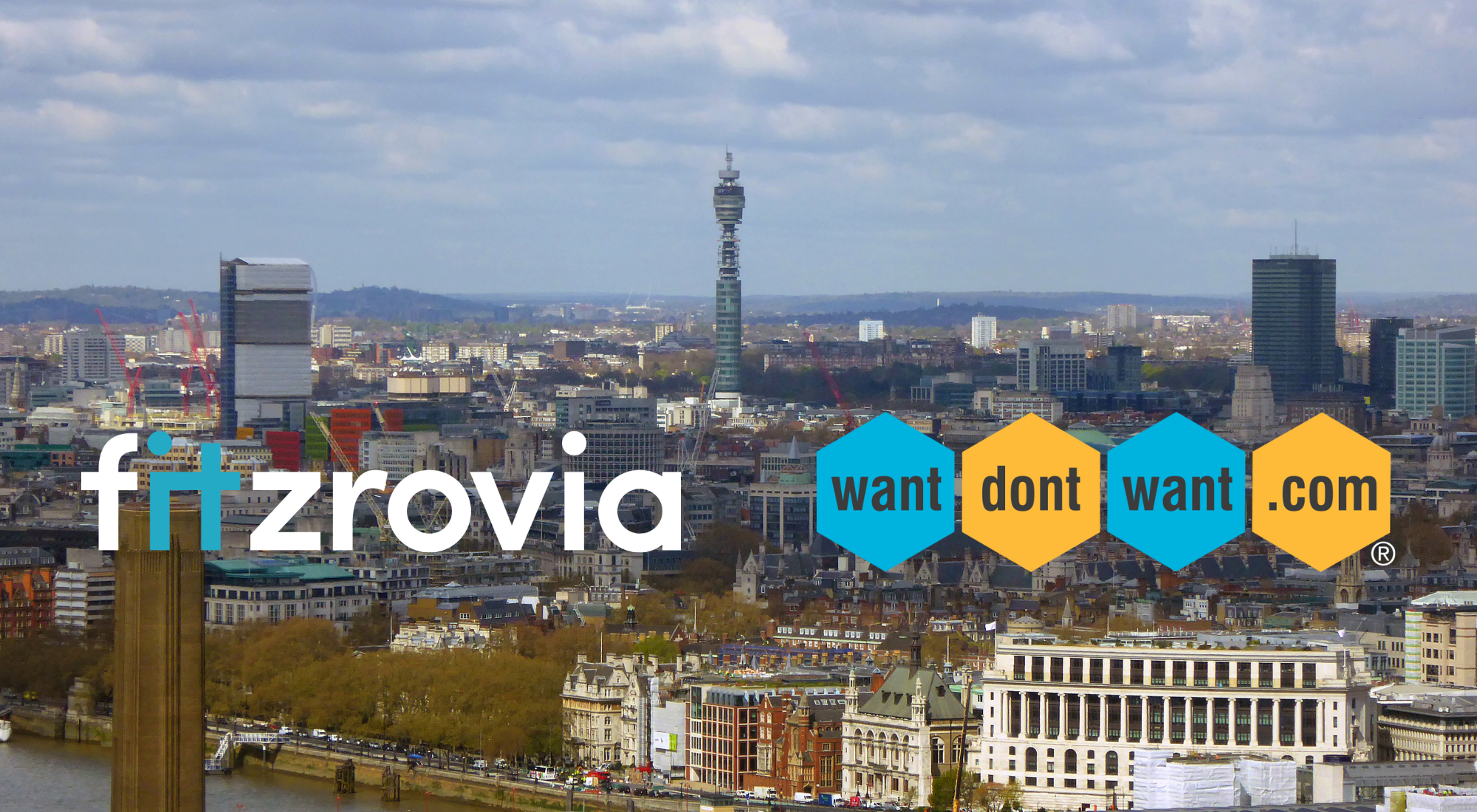 Fitzrovia IT logo and wantdontwant logo in front of the Fitzrovia Skyline at daytime.