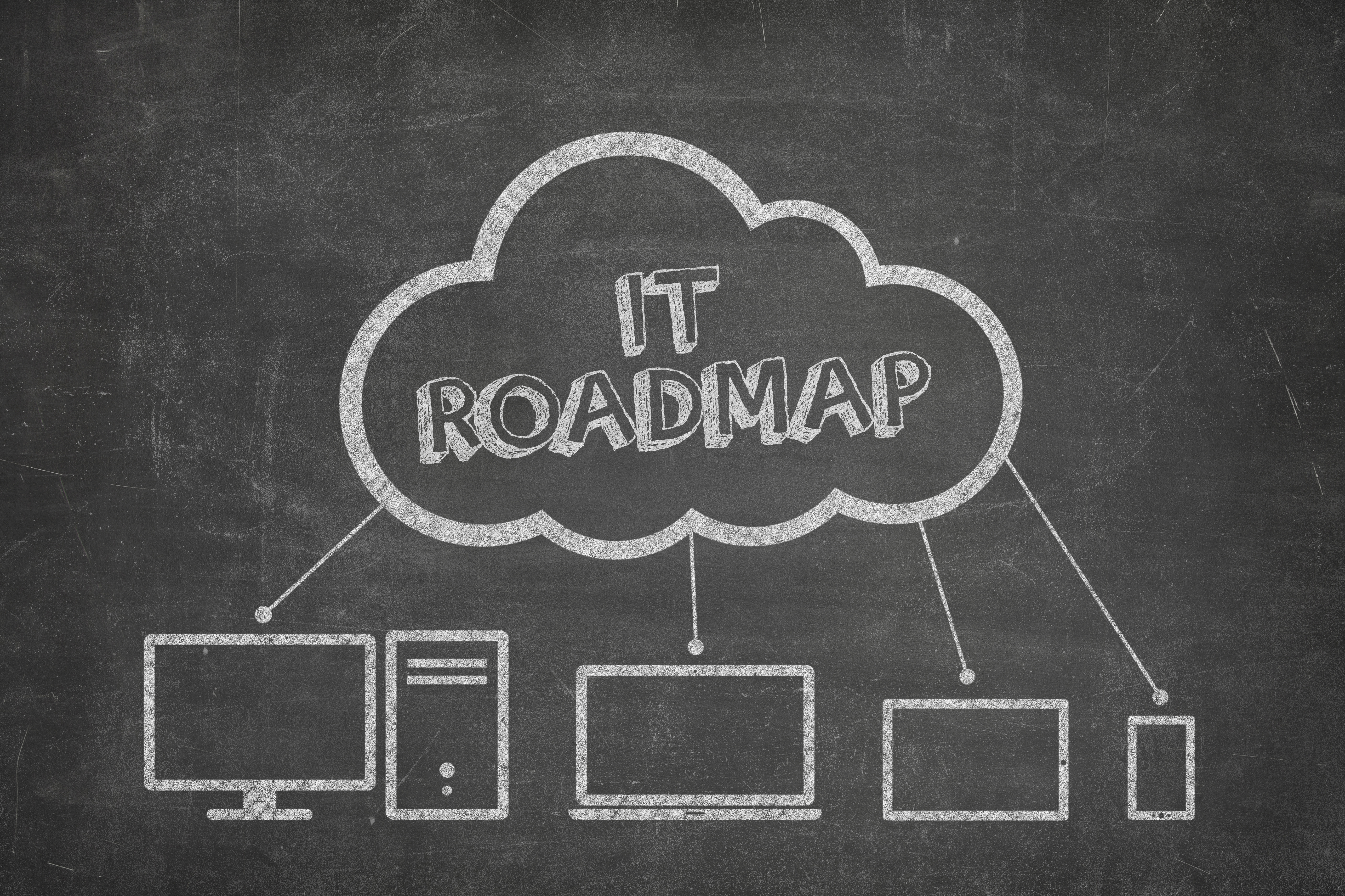 Featured image: IT roadmap on chalkboard - How can an IT roadmap help your business cut its ad-hoc IT spending?
