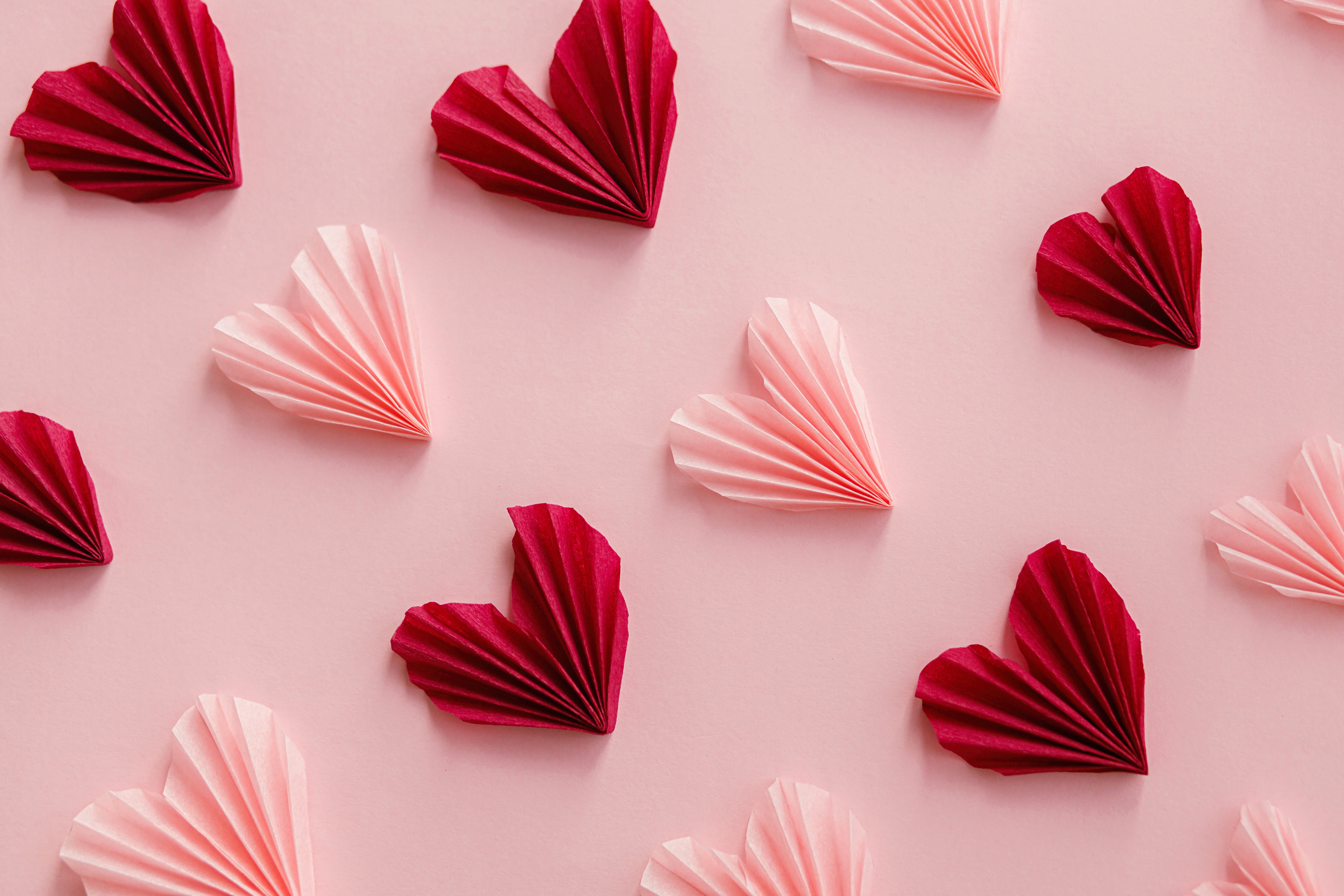 Featured image: Origami hearts in pink and red - Lost the spark with your MSP? 8 things to look for in an IT partner.